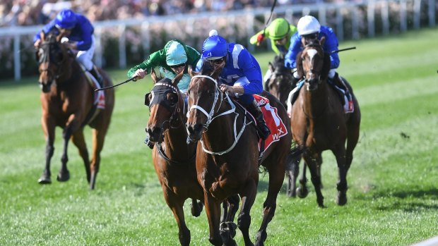 Super mare: Hugh Bowman rides Winx to victory in the Cox Plate ahead of Humidor in October.