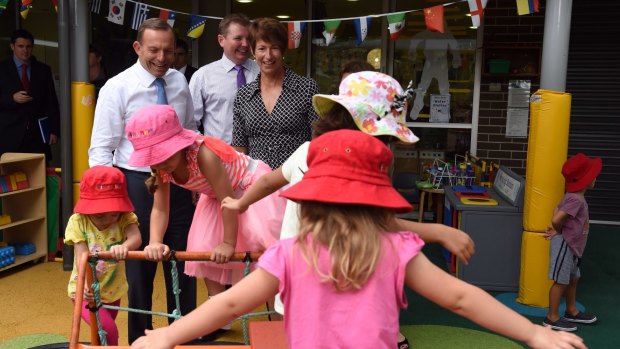Tony Abbott and his wife Margie meet kids at the Little Pines Childcare Centre in Russell Lea on Tuesday.