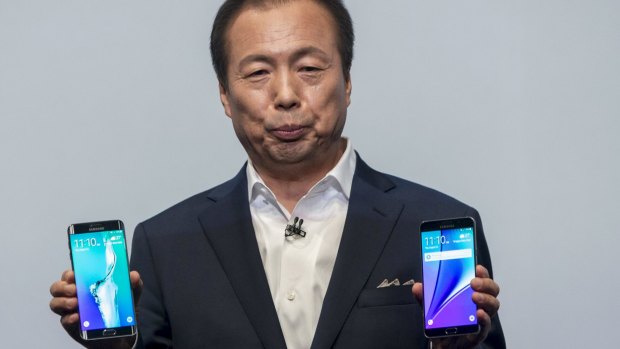 Samsung CEO JK Shin showcasing the Galaxy S6 Edge+ (left) and Galaxy Note 5 at an event in New York.