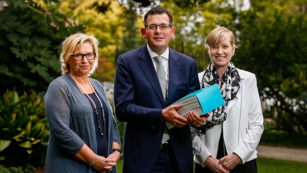 Rosie Batty, Premier Daniel Andrews, and Fiona Richardson, Minister for the Prevention of Family Violence, at the release of the report by the Royal Commission into Family Violence at Parliament House on March 30.