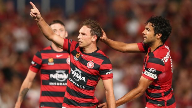 Double: Brendon Santalab of the Wanderers celebrates scoring.