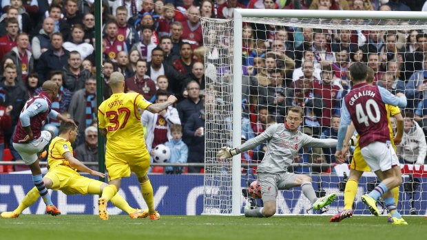 Fabian Delph scores the second goal for Aston Villa during their FA Cup semi-final against Liverpool on Sunday.