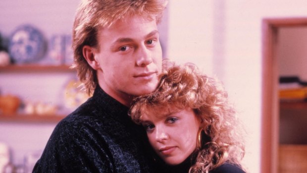 Jason Donovan and Kylie Minogue as Scott and Charlene in <i>Neighbours</i>.