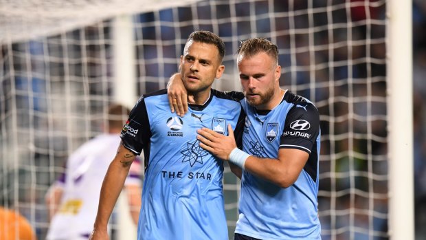 No mistake: Bobo celebrates a goal from the spot with Jordy Buijs.