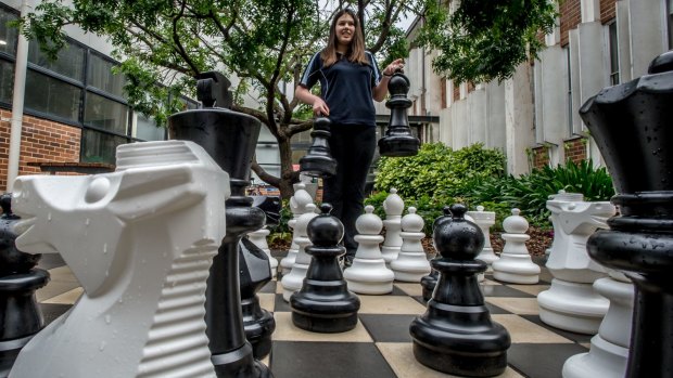 Saffron, 13, plays chess to challenge herself mentally.