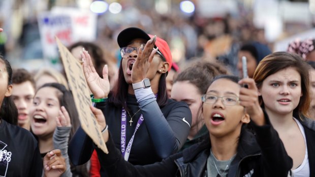 Students from Garfield High School protest the results of the US presidential election in Seattle on Monday. 