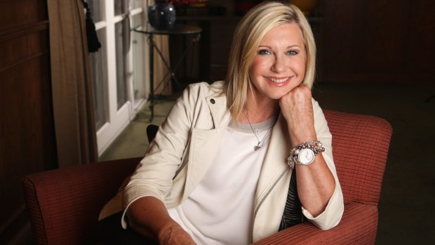 Singer and actress Olivia Newton-John says that everyone has been, "sadly, touched by cancer".
