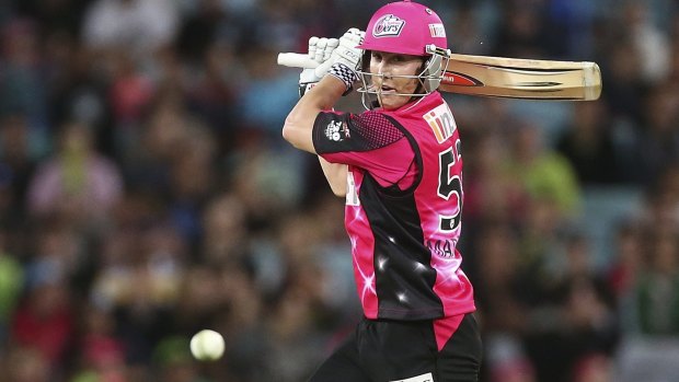 Sitting pretty in pink: Sydney Sixers batsman Nic Maddinson.
