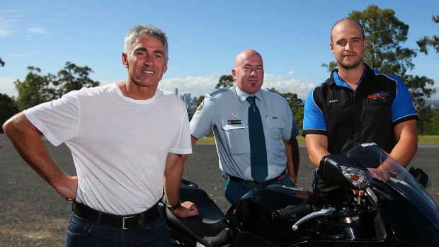 Mick Doohan (L), paramedic James Thompson and instructor Elliot Stone (R) during the  launch.