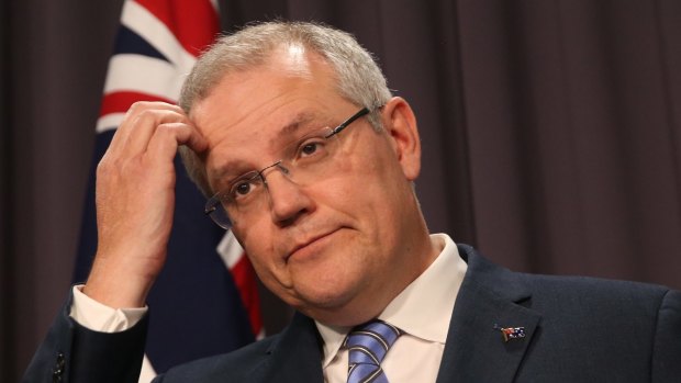 Treasurer Scott Morrison says he's always been careful about making surplus predictions.