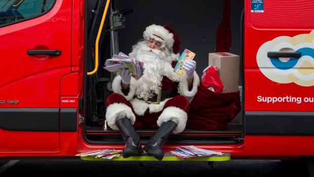 Santa spent a busy morning reading through all the letters he's received. He was at the Australia Post business hub in Port Melbourne. 