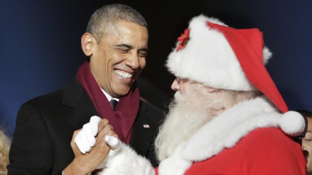 First Christmas: Obama and Santa, December 4, 2014.