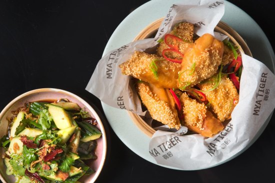 Prawn 'toasts' in Chinese doughnuts and smashed cucumber salad.