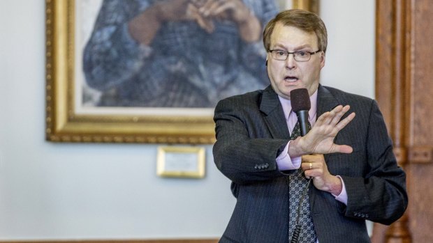Let students arm themselves ... Senator Brian Birdwell tries to explain language in a bill that will let students carry concealed handguns at universities in the Senate chamber at the Texas State Capitol.