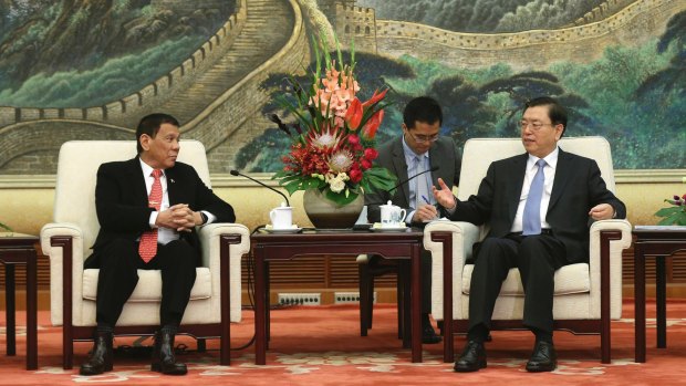 Philippines President Rodrigo Duterte, seen here in Beijing (left), has caused regional concern by "separating" from the US to start talks with Beijing.