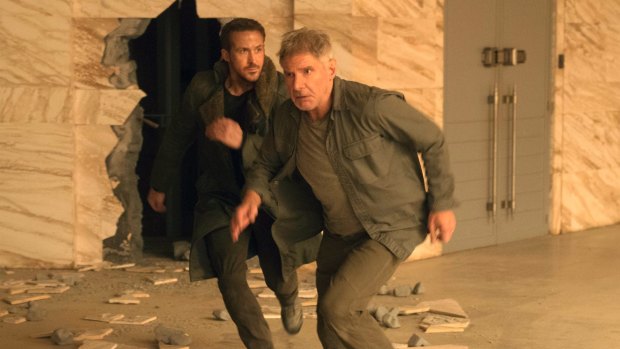 Ryan Gosling, left, and Harrison Ford in <i>Blade Runner 2049</i>.