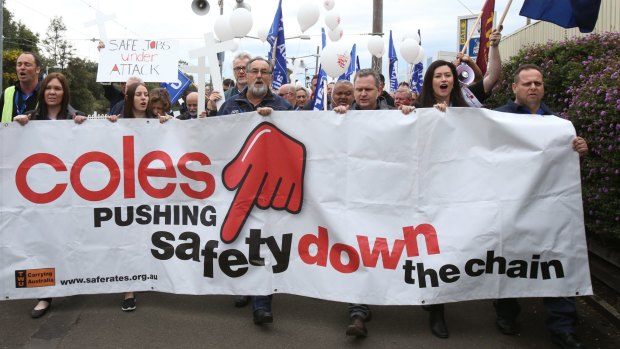 Downward slide: SMH transport workers hold a protest rally  to highlight the lethal squeeze from supermarket giant Coles on truck drivers. 