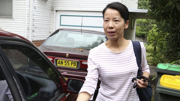 Kathy Lin leaving her North Epping home to visit her husband Robert Xie in jail ahead of his release on bail.