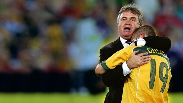 Good times: Coach Guus Hiddink savours Australia's qualification for the 2006 World Cup.
