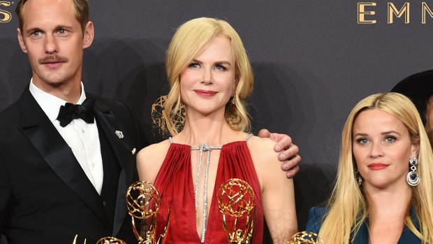 Alexander Skarsgard, Nicole Kidman and Resse Witherspoon with some of the Emmys awarded to Big Little Lies.