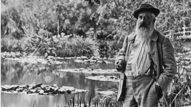 Claude Monet by his beloved lily pond in Giverny.