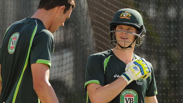 Man of the moment: Smith trains in the nets with fast bowler Josh Hazelwood on Monday.