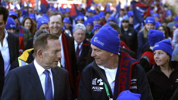 Tony Abbott, left, joins  Daniher.