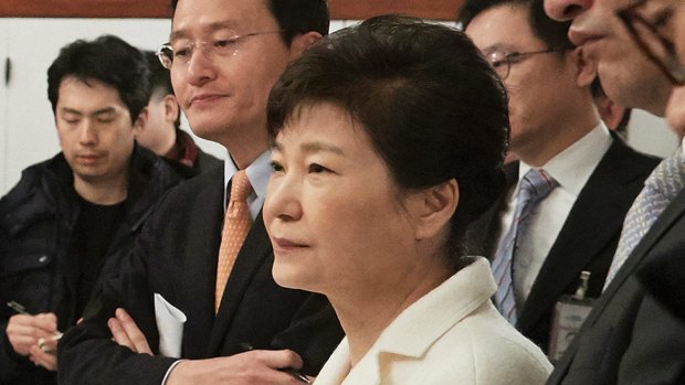 Impeached South Korean President Park Geun-hye listens to a reporter's question during a meeting with a selected group of reporters in January. 1, 2017. 