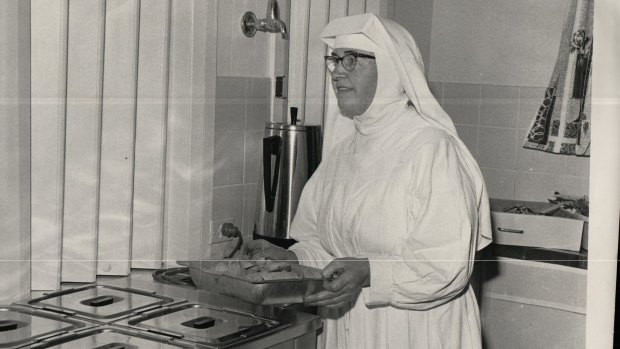 One of the sisters serves up a baked dinner in the early days of Marymead.