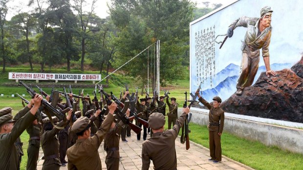 North Koreans sign up to join the army amid the tensions earlier in the week.