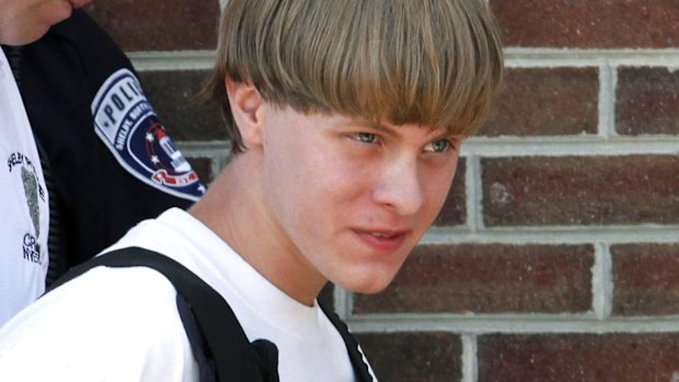 Arrested: Alleged gunman Dylann Roof.