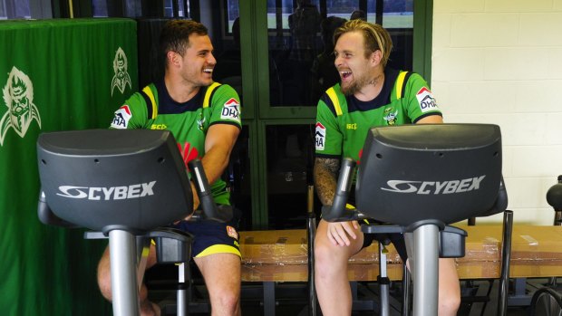 Injured Canberra Raiders players Aidan Sezer and Blake Austin have a laugh in rehab on Thursday.
