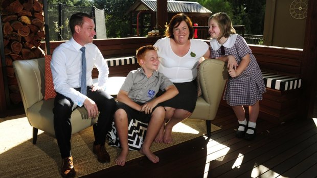 Diplomat Trudy McGowan at home Canberra with her family, from left, Justin, Will,12 and Genevieve,9. She was a primary school teacher before she joined DFAT.