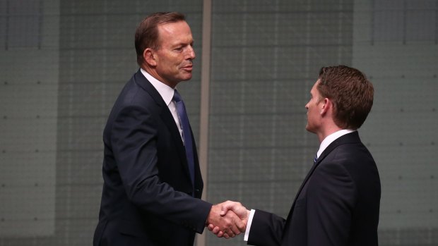 Mr Hastie is congratulated by former prime minister Tony Abbott.