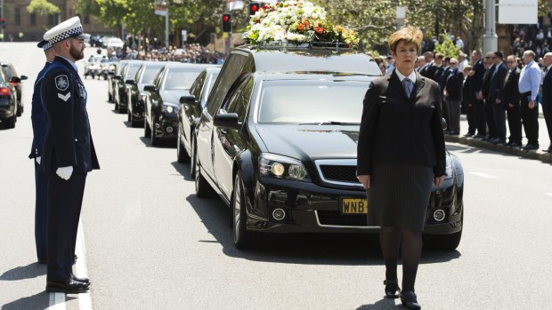 1500 mourners attended the funeral of police worker Curtis Cheng.