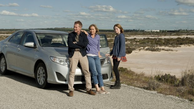 Richard Roxburgh, Radha Mitchell and Odessa Young in <i>Looking for Grace</i>, in which frantic parents set off to find their runaway daughter. 