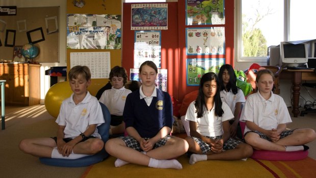 Students meditate at the Maharishi school
