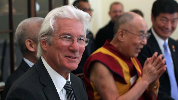 Actor Richard Gere accompanies the Dalai Lama during a meeting with members of the US Congress on Tuesday, 