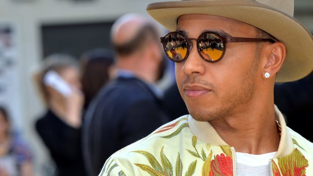 Formula One driver Lewis Hamilton likes his floral attire, photographed here at the London premiere of the film Minions.