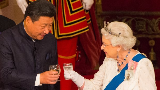 Chinese President Xi Jinping, left, toasts with Queen Elizabeth II during a state banquet at Buckingham Palace in London in October.