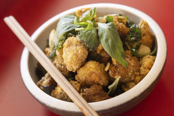 Crispy Taiwanese-style popcorn chicken with Thai basil and garlic.