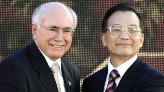 June 2006: John Howard and then Chinese premier Wen Jiabao press a launch button to mark the beginning of deliveries of liquid natural gas to China's Guangdong province.