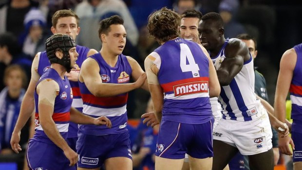 Majak Daw has a go at Bontempelli, but the Bulldog responded well.