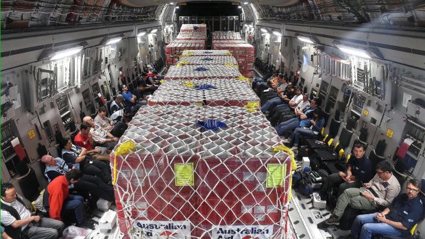 Aid onboard an Australian RAAF C-17 Globemaster on its way to Port Vila.