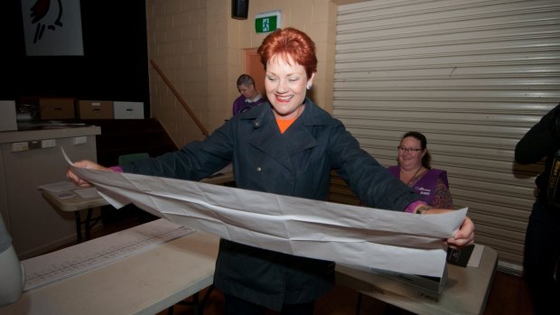Pauline Hanson and her 102-centimetre Senate ballot paper at Jamboree State School.