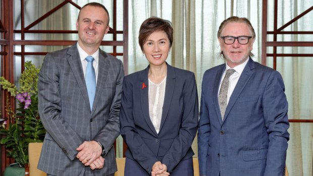 Chief Minister Andrew Barr with Singapore's Senior Minister of State Josephine Teo and Australian High Commissioner Philip Green.