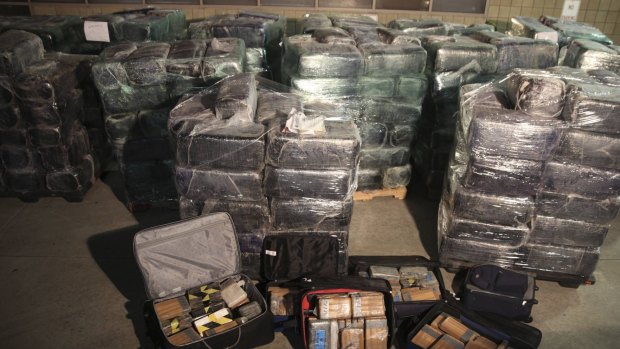 Seized drugs are shown in a smuggling tunnel  between the US and Mexico.
