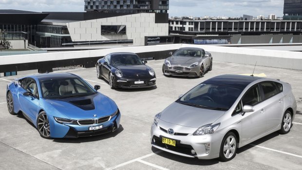 Face-off: From left, the BMW i8, Porsche 911 Carrera S, Aston Martin Vanquish and Toyota Prius.