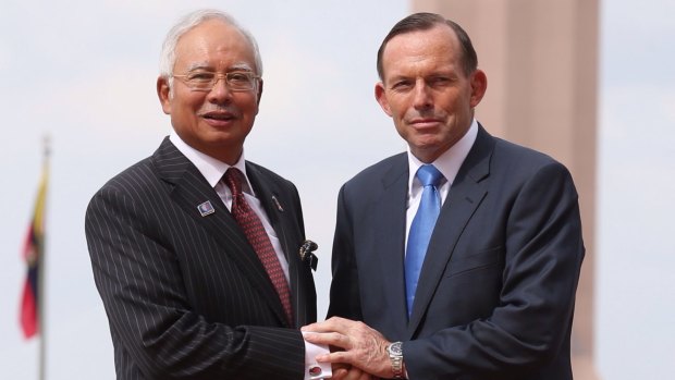 Tony Abbott with Najib Razak in Malaysia last year. 