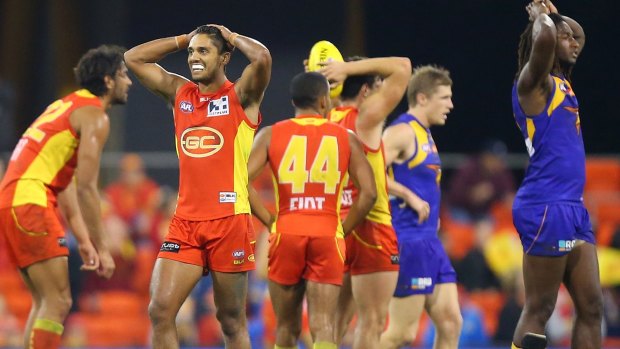 Eagles and Suns alike react to their drawn round 18 match at Metricon Stadium.